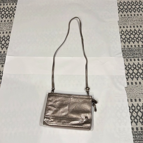 The Sak Silver Metallic Crossbody Bag Adjustable Strap Inside Outside Pockets - Picture 2 of 10